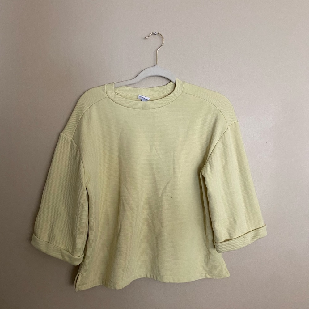 A new day yellow sweater